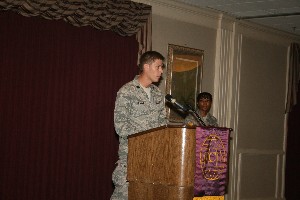Capt. Patrick Reagan, USAF, flight commander, plans and operations, 3rd Combat Communications Support Squadron, and chapter vice president for membership, addresses the attendees of the September luncheon.